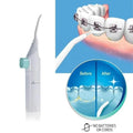 Cordless manual water flosser for portable deep dental cleaning care