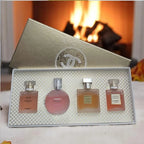 Elegant women perfume collection featuring Chanel mini scent bottles